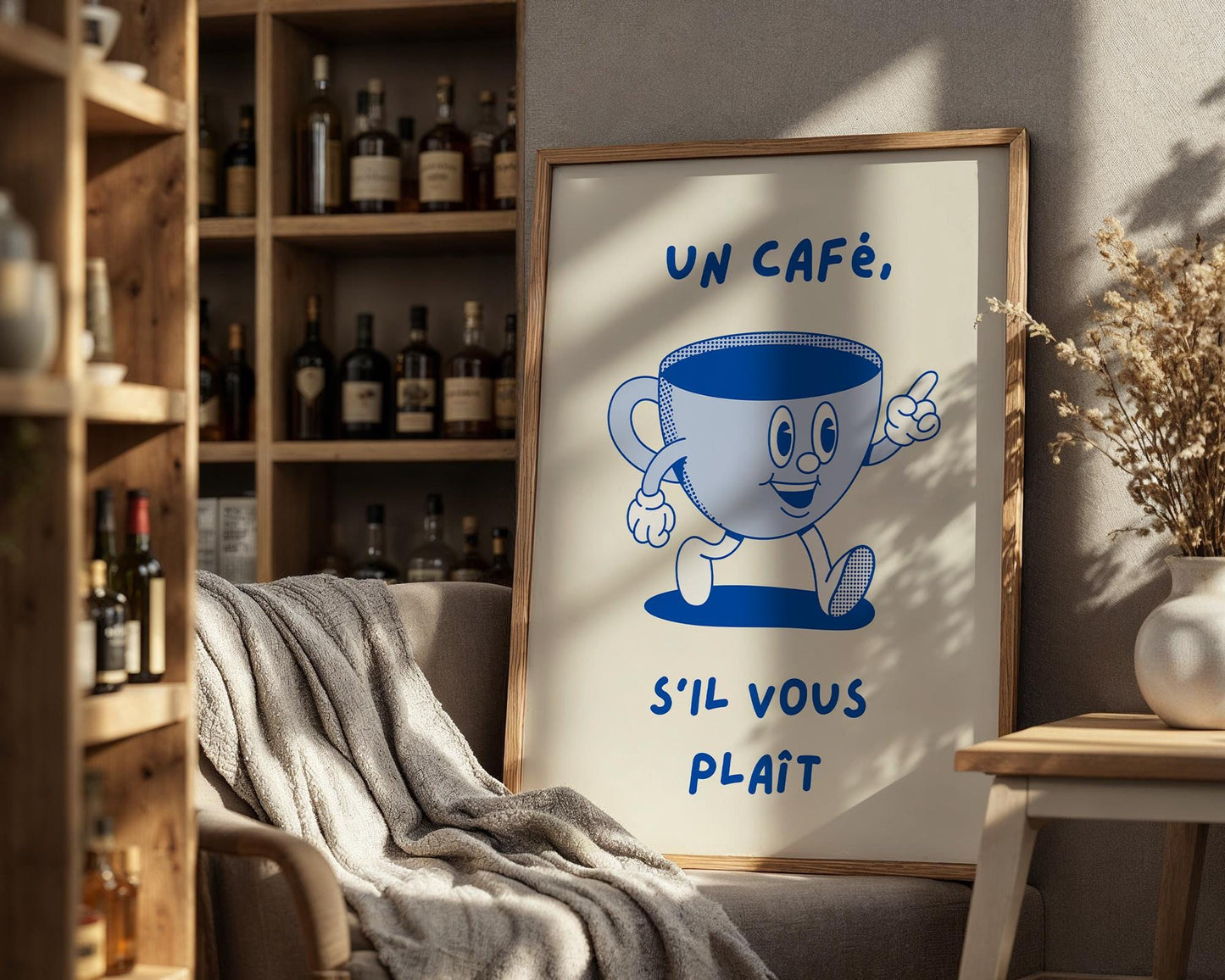 French café kitchen wall art with the phrase “Un Café S’il Vous Plaît” in blue lettering on a light background.