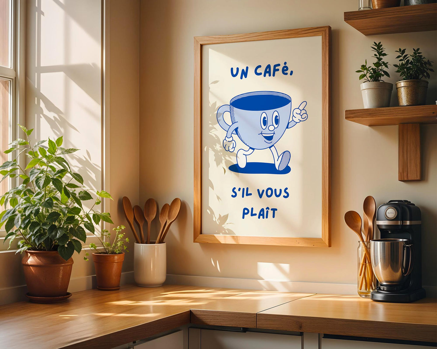 French café kitchen wall art with the phrase “Un Café S’il Vous Plaît” in blue lettering on a light background.