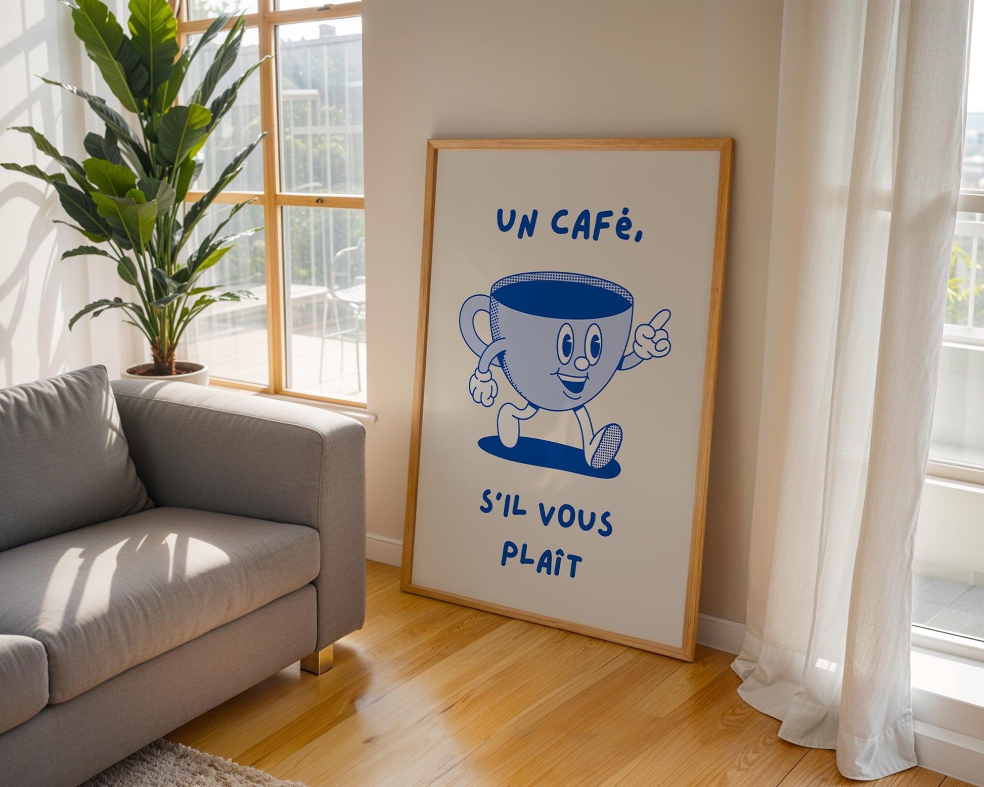 French café kitchen wall art with the phrase “Un Café S’il Vous Plaît” in blue lettering on a light background.