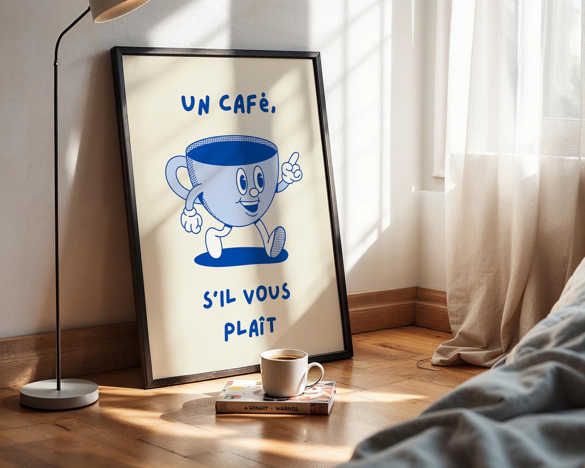 French café kitchen wall art with the phrase “Un Café S’il Vous Plaît” in blue lettering on a light background.