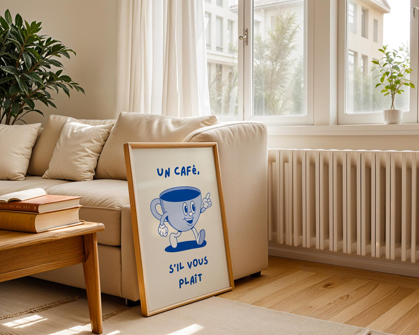 French café kitchen wall art with the phrase “Un Café S’il Vous Plaît” in blue lettering on a light background.