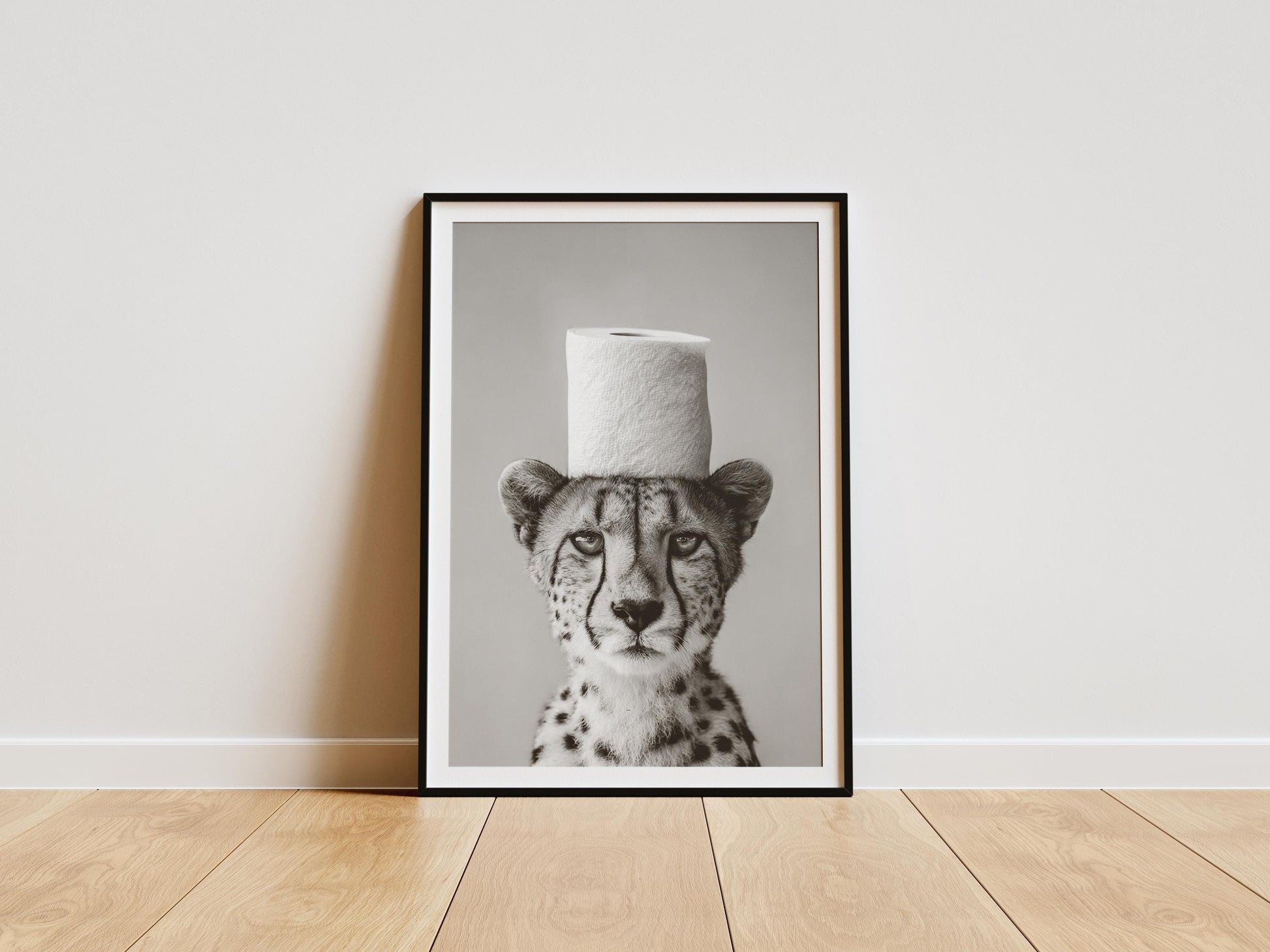Funny cheetah bathroom print with toilet paper roll on head black and white wall art