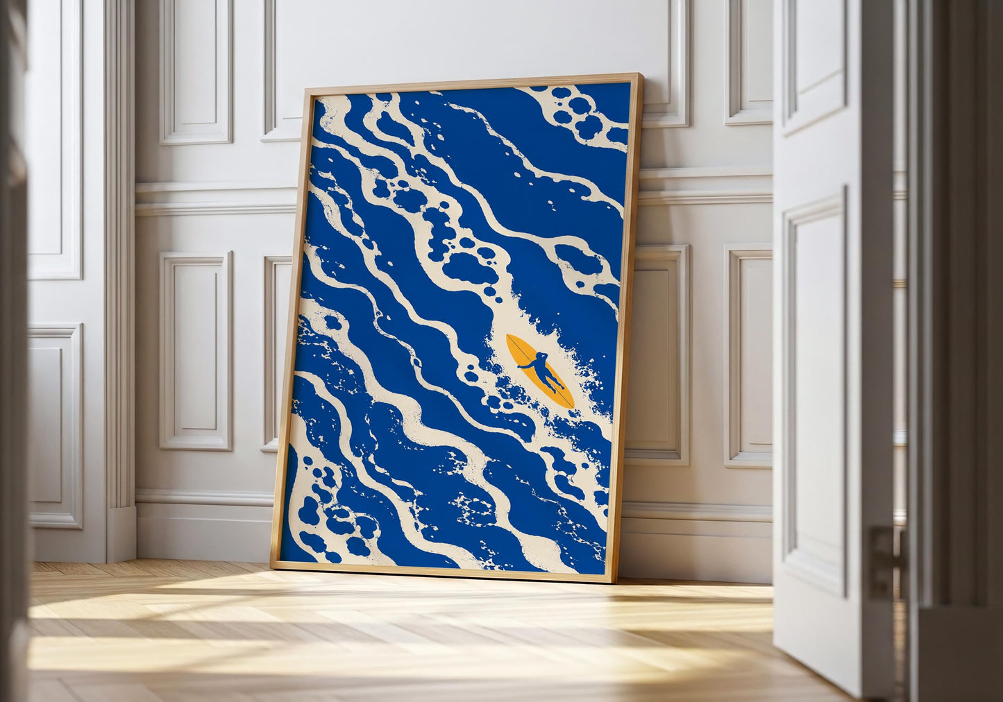 Blue surf wall art featuring a lone surfer riding through abstract ocean waves