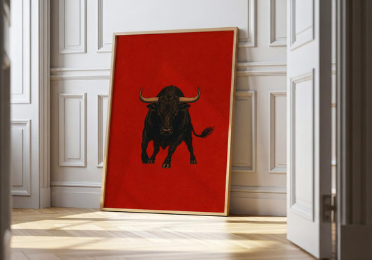 Spanish bull wall art featuring a powerful black toro on a vibrant red background