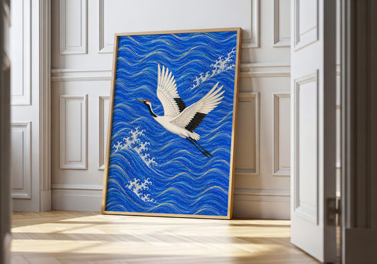 Japanese crane flying over vibrant blue ocean waves artwork