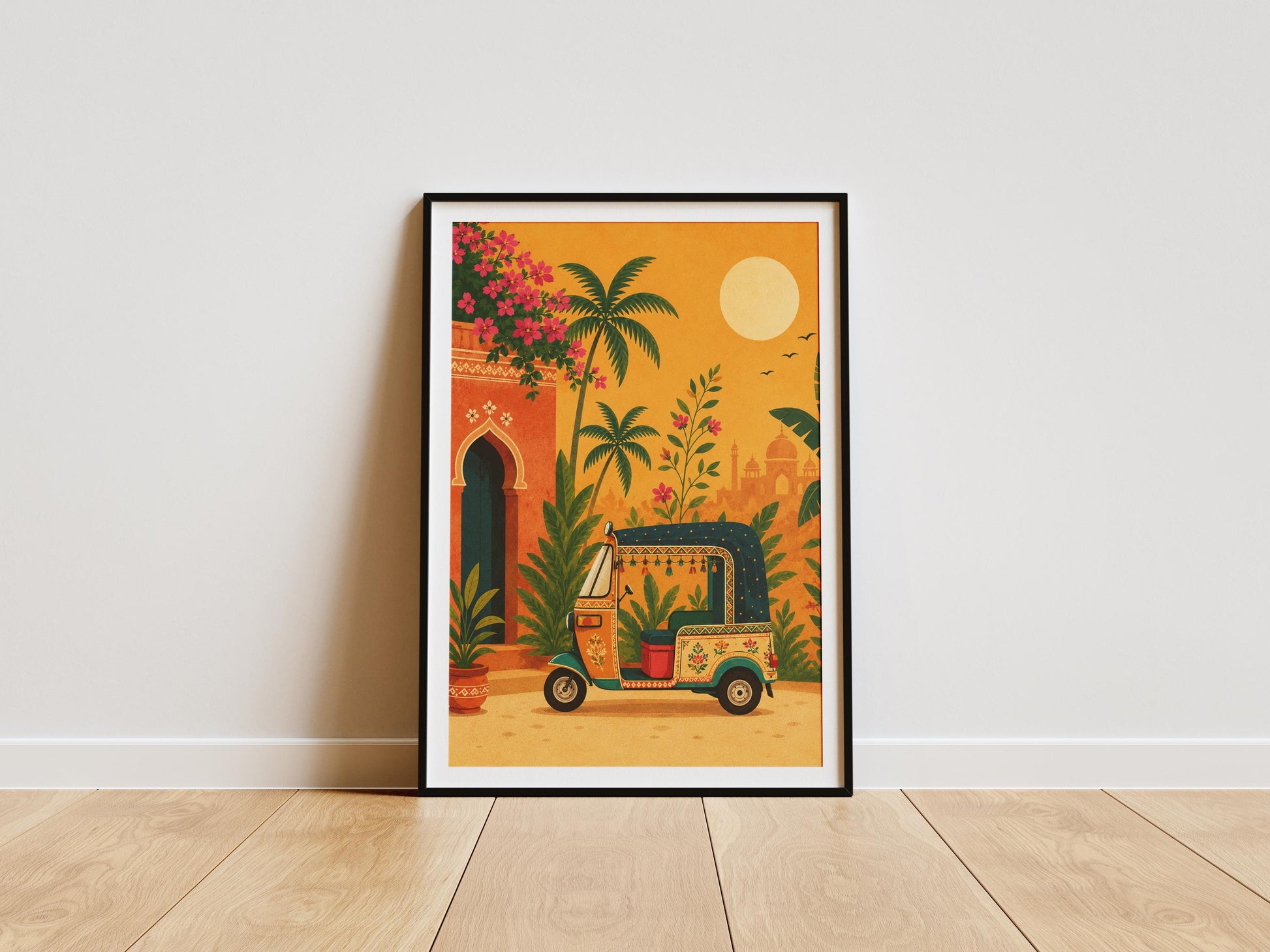 Colourful Indian tuk tuk wall art featuring tropical plants and Jaipur-inspired architecture at sunset.