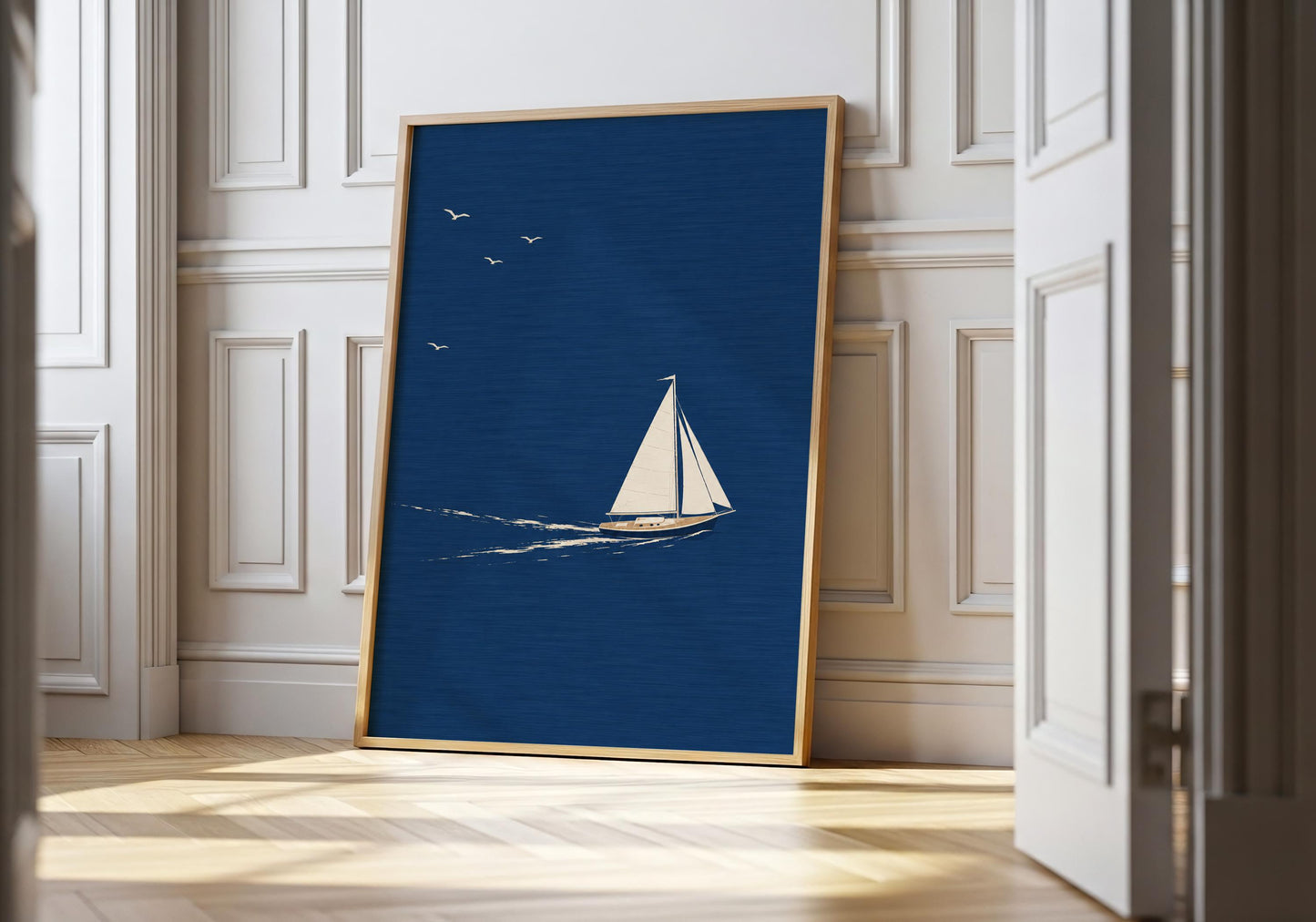 Beach house decor print depicting a sailboat sailing across calm open water.
