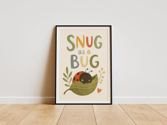 Snug As A Bug nursery wall art featuring a sleeping ladybird on a green leaf.