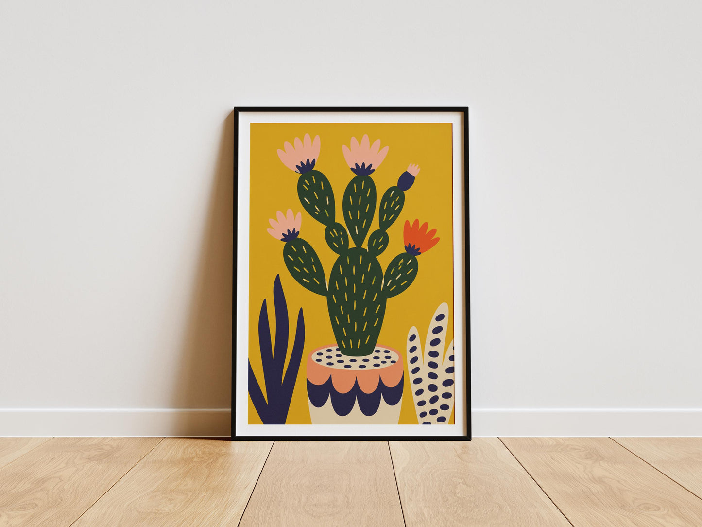 Mexican botanical wall art featuring a colourful prickly pear cactus with blooming flowers on a mustard yellow background.