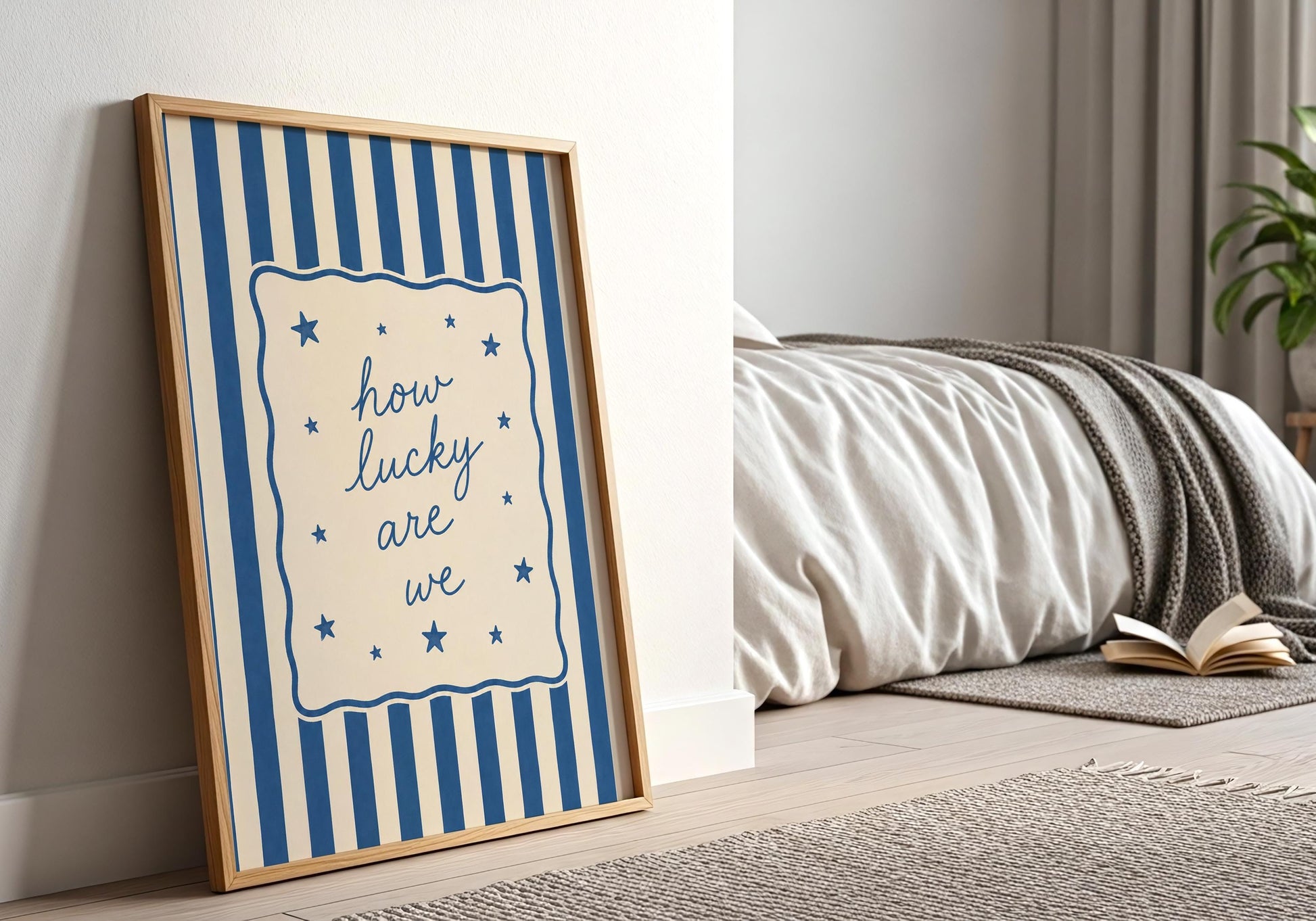 Blue quote wall art featuring the How Lucky Are We phrase in a minimalist design.