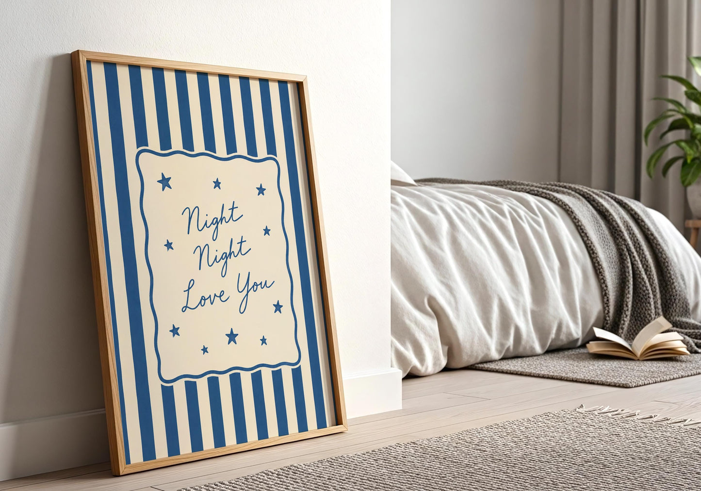 Blue nursery typography print with elegant script lettering.