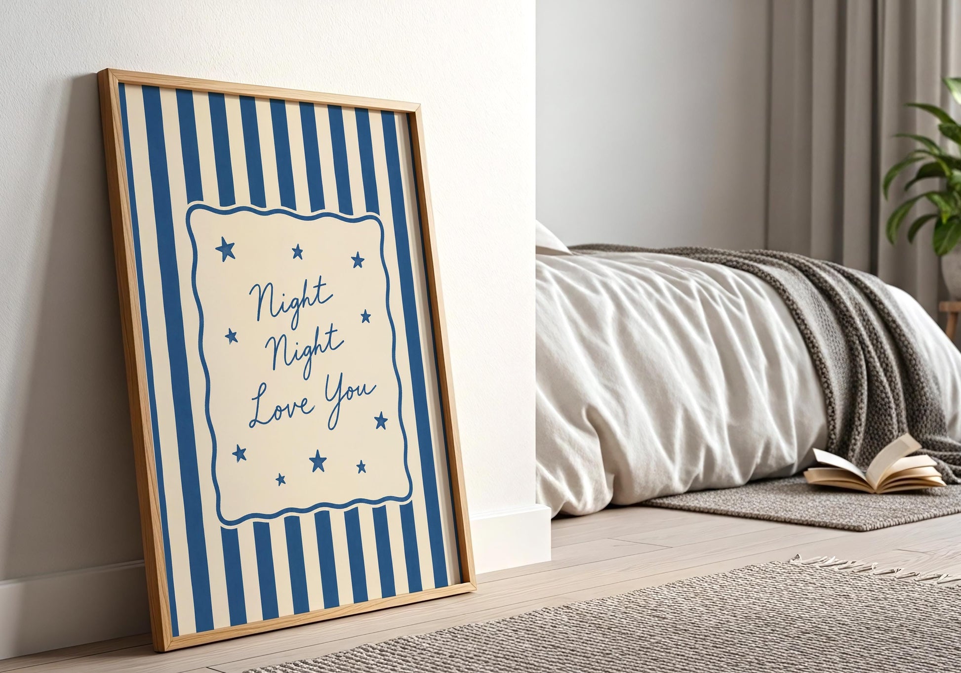 Blue nursery typography print with elegant script lettering.