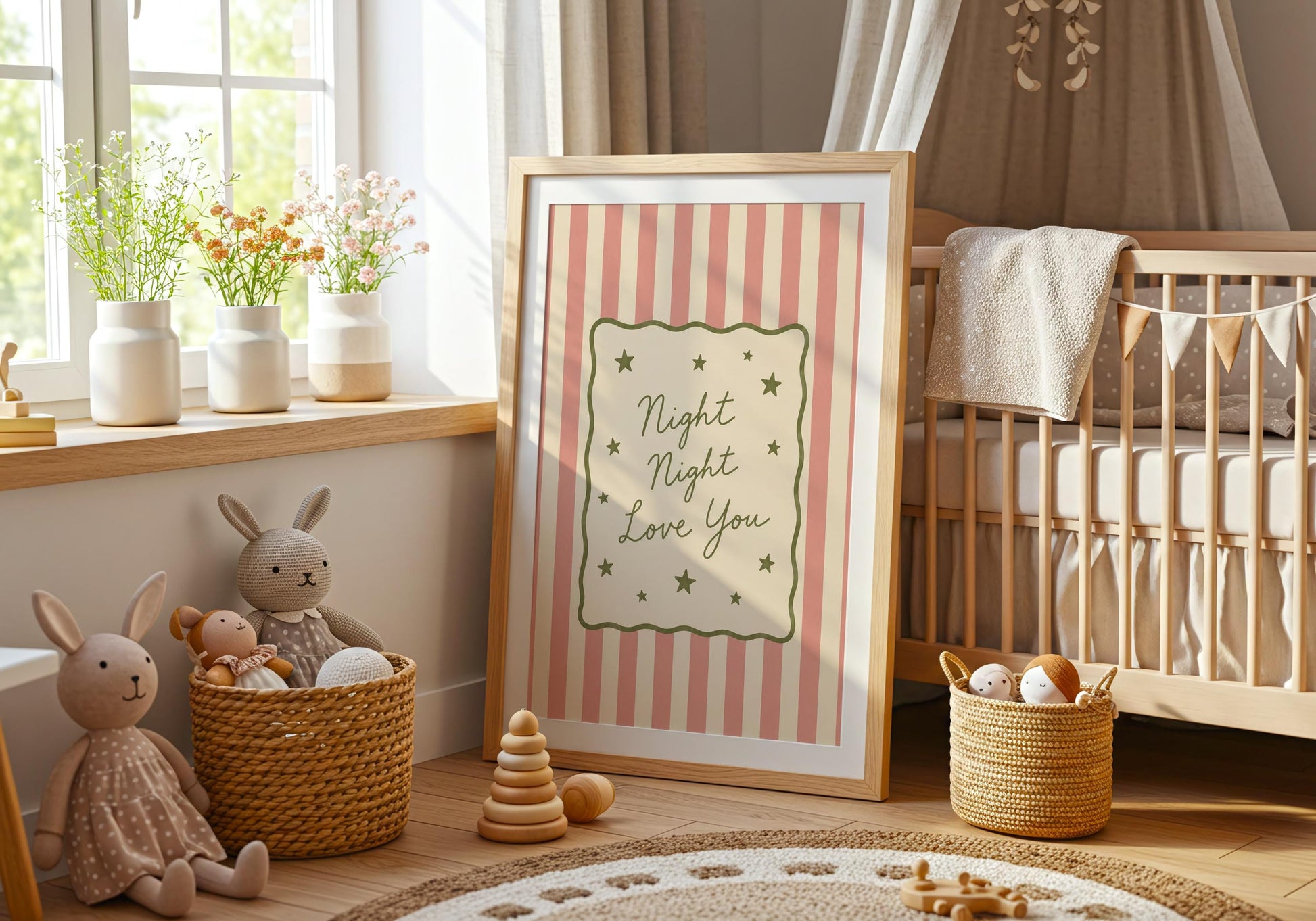 Soft pastel nursery decor with striped wall art.