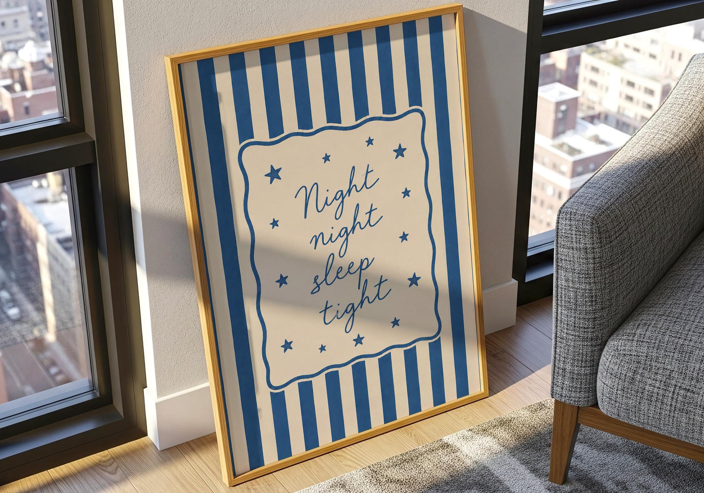 Blue nursery typography print with elegant script lettering and stars.