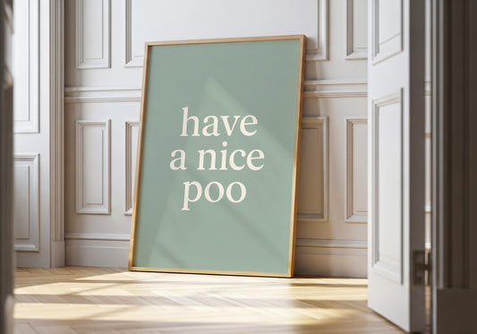 Funny bathroom wall art featuring the phrase "Have a Nice Poo" in minimalist typography on a sage green background.