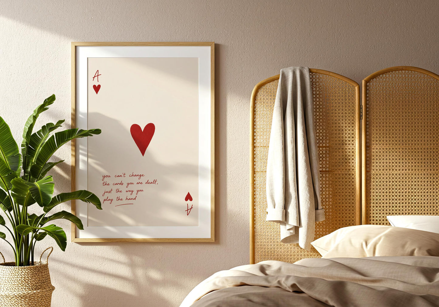 Neutral bedroom décor featuring Ace of Hearts artwork.