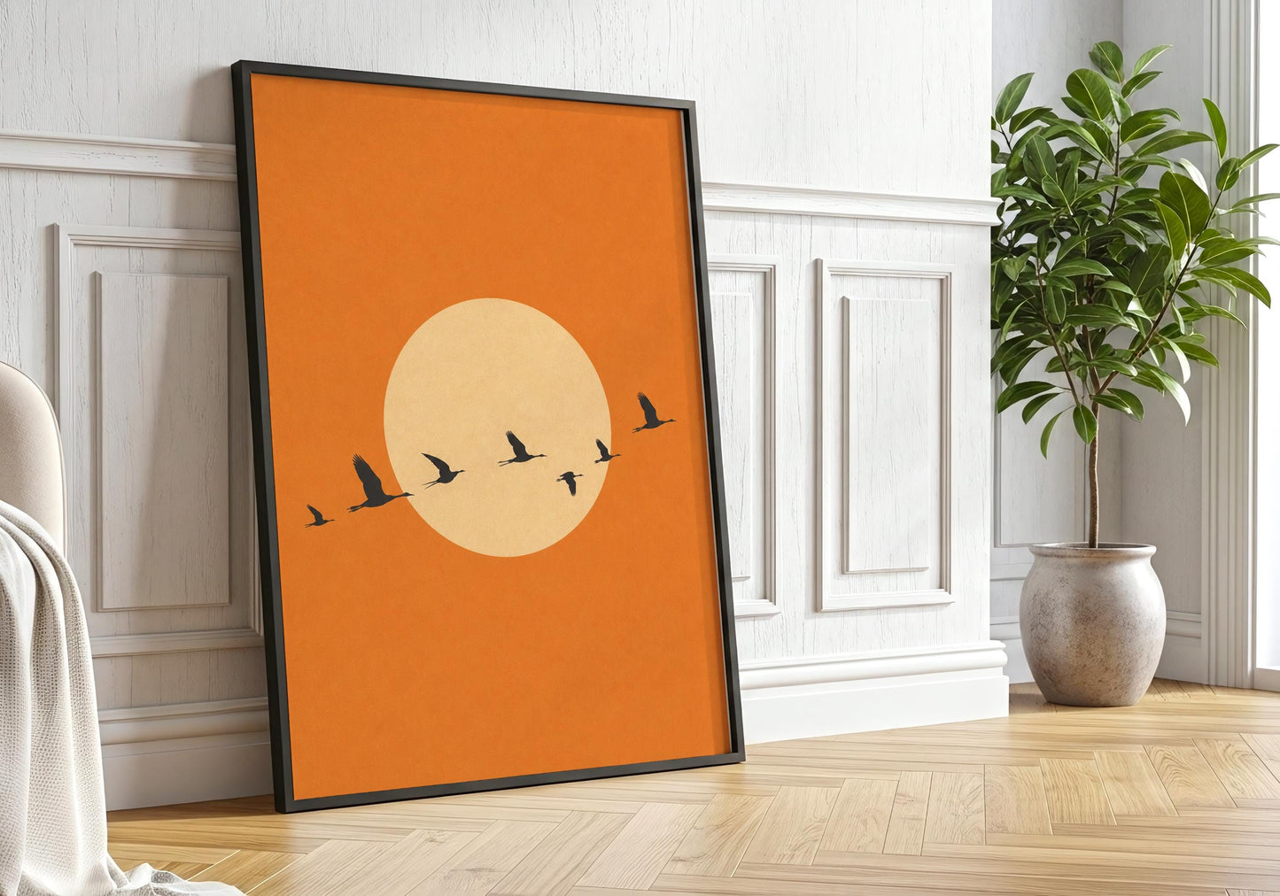 Boho orange wall decor featuring flying birds.
