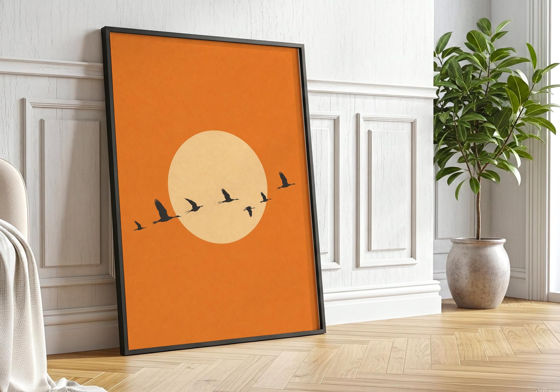 Boho orange wall decor featuring flying birds.