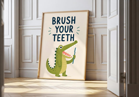Brush your teeth wall art featuring a cute crocodile holding a toothbrush for kids bathroom décor.