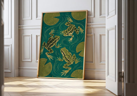 Botanical frog wall art featuring three frogs surrounded by lily pads in a tranquil teal pond.