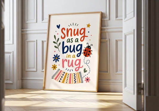 Snug as a Bug in a Rug nursery quote print with colourful typography and a cute ladybird illustration.