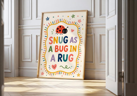 Snug As A Bug In A Rug nursery wall art featuring colourful typography and a smiling ladybird illustration.