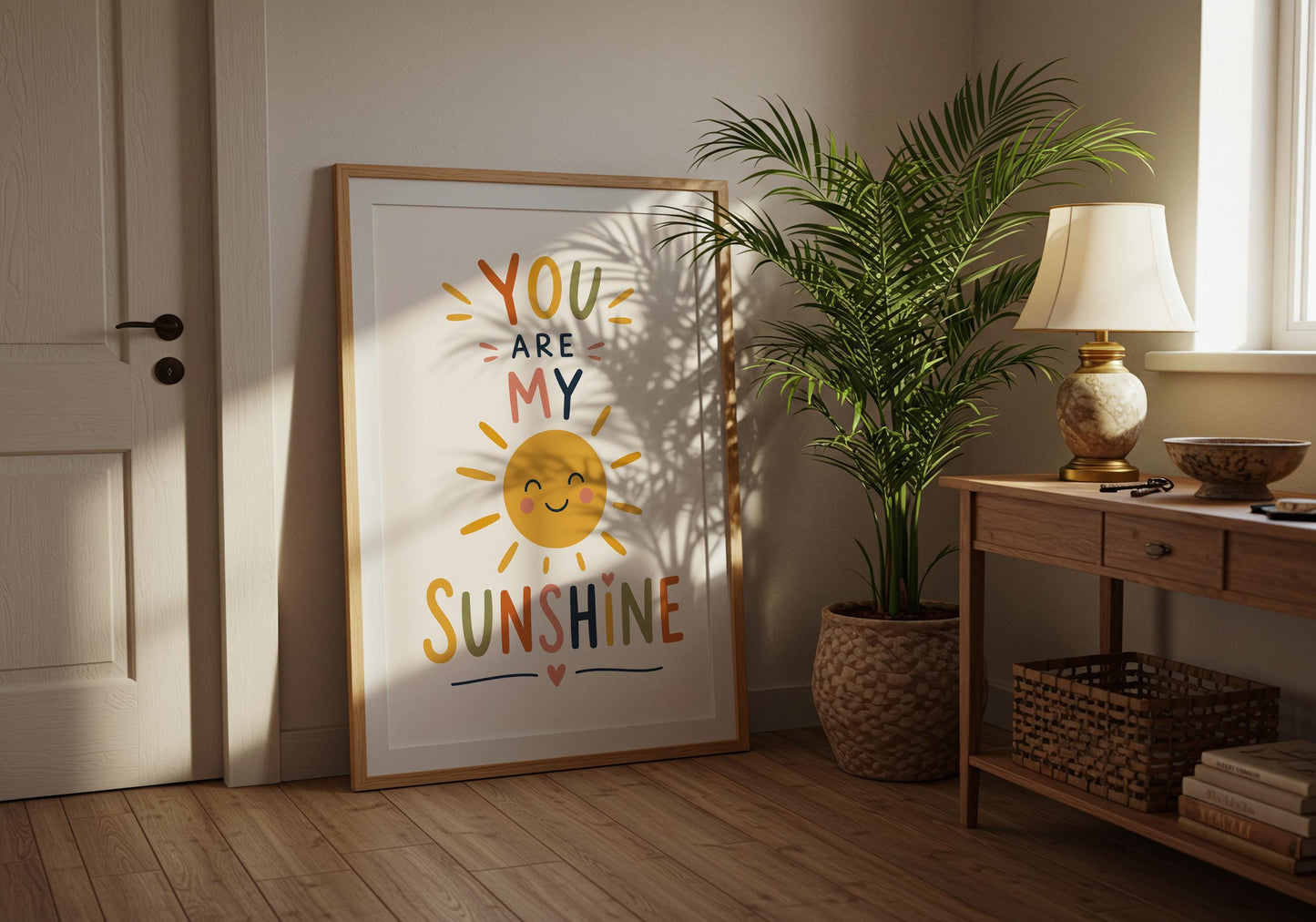 Modern Scandi nursery decor with cheerful sunshine artwork.