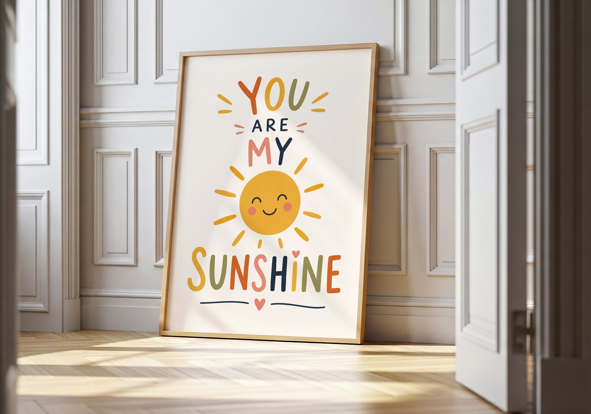 You Are My Sunshine nursery wall art with smiling sun illustration.