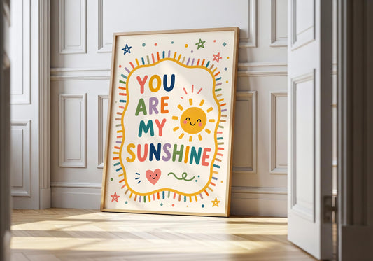 You Are My Sunshine nursery wall art with colourful typography and smiling sun illustration for a baby's room.