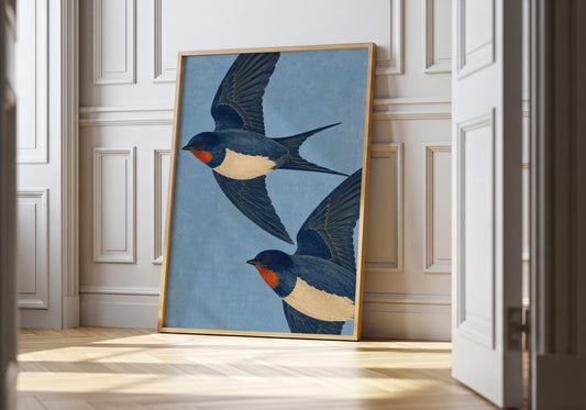 Vintage blue swallow wall art featuring two flying swallows, elegant statement artwork for Grandmillennial and English country interiors.
