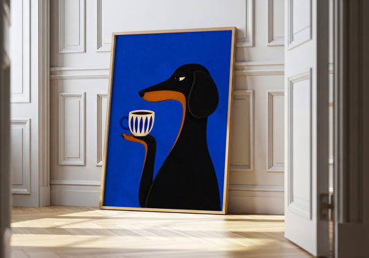 Minimalist blue dachshund wall art featuring a black sausage dog holding a patterned coffee cup against a cobalt blue background.