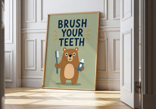 Neutral woodland bear bathroom print with Brush Your Teeth quote, cute bear holding a toothbrush and toothpaste on a sage green background.