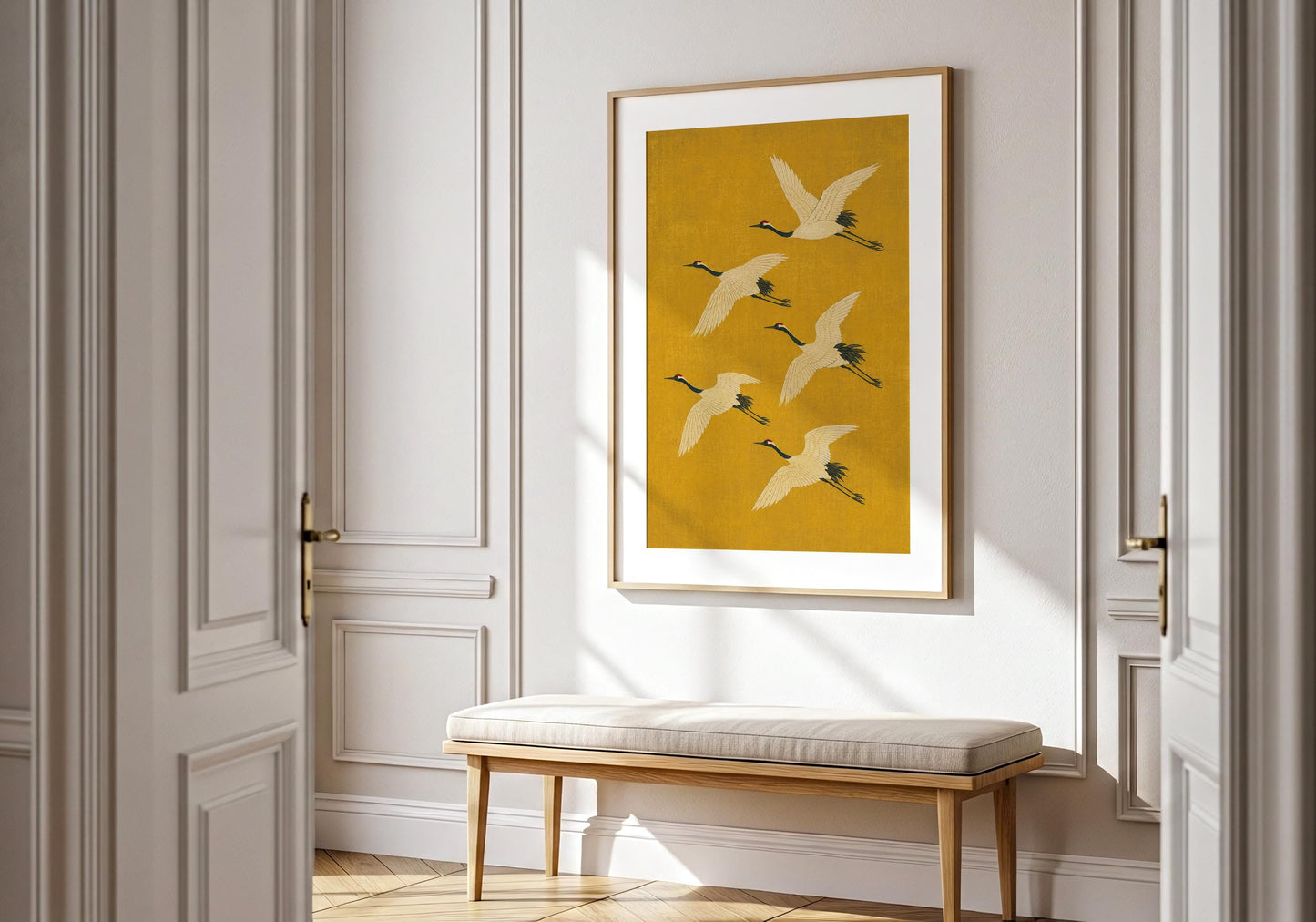 Modern Asian bird wall art with white cranes soaring across a textured golden background for peaceful minimalist interiors.