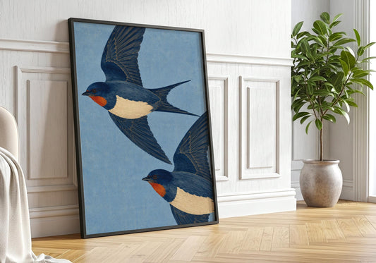 Traditional bird print with two swallows in flight on a soft blue background, ideal for classic living room and hallway decor.