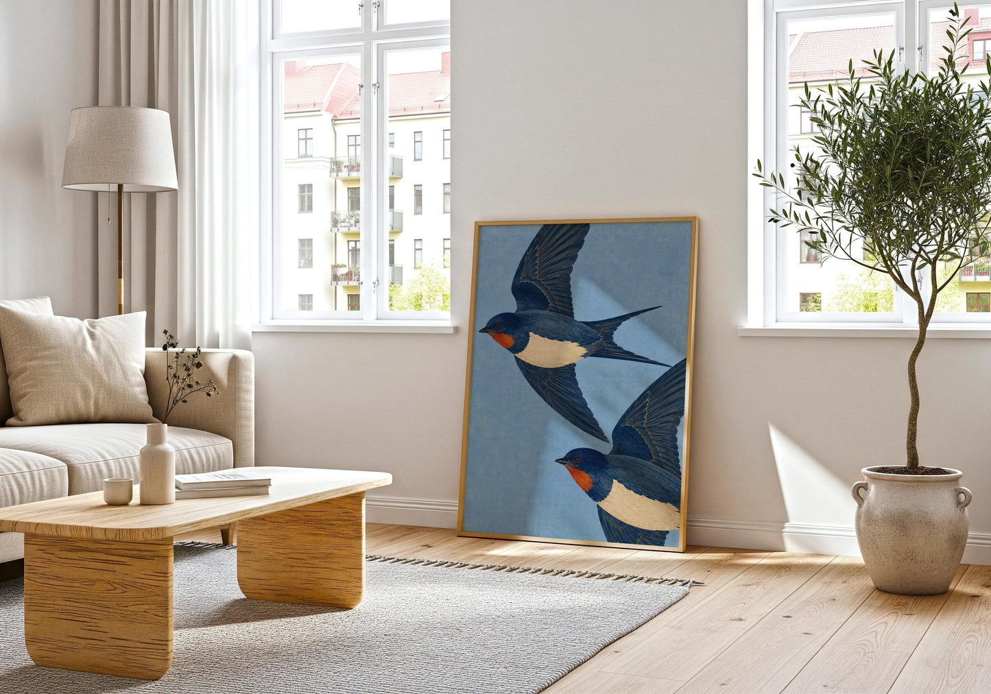 English country wall art featuring graceful blue swallows in flight, inspired by classic natural history illustrations.