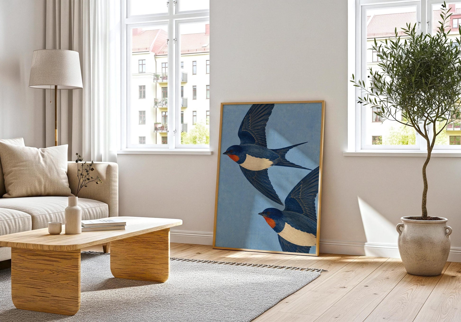 English country wall art featuring graceful blue swallows in flight, inspired by classic natural history illustrations.