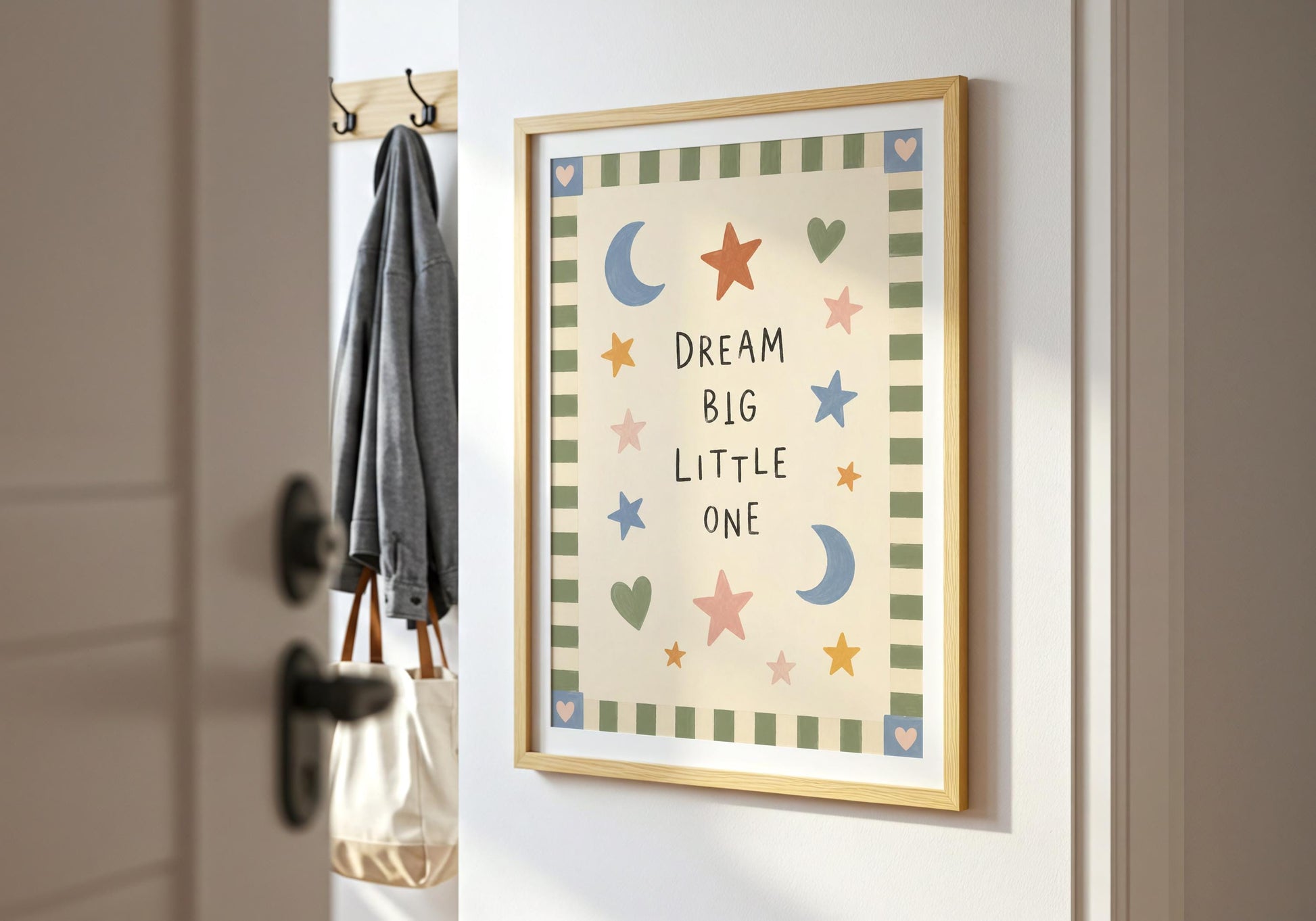 Modern kids room wall art featuring an encouraging Dream Big Little One message and celestial illustrations.