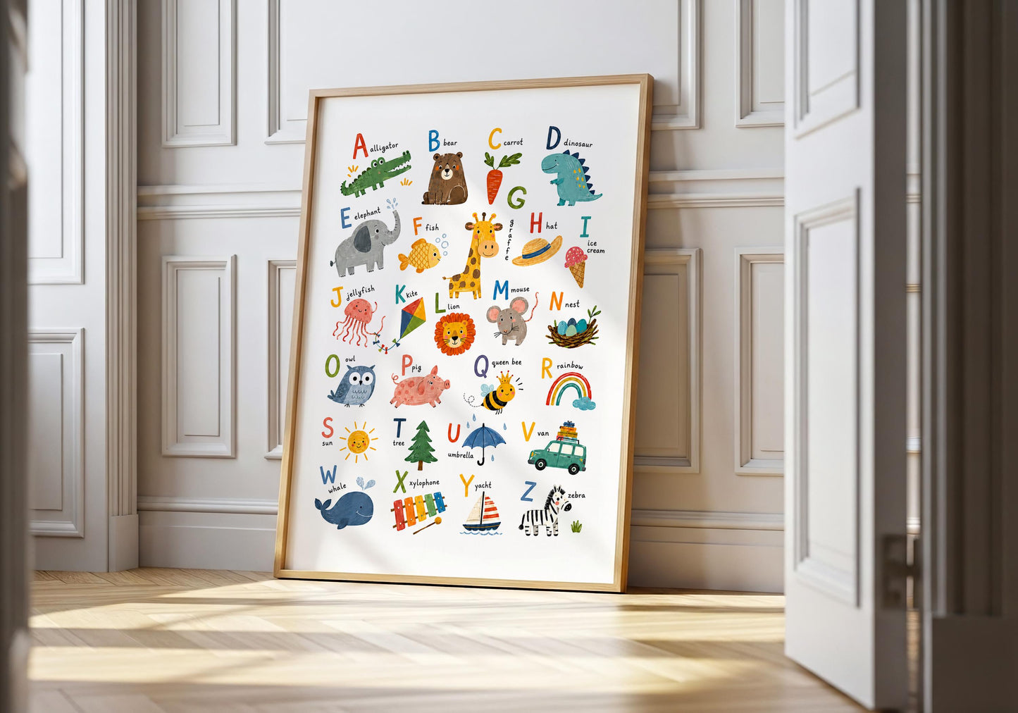 Colourful alphabet nursery wall art featuring A to Z letters with playful illustrated animals and objects.