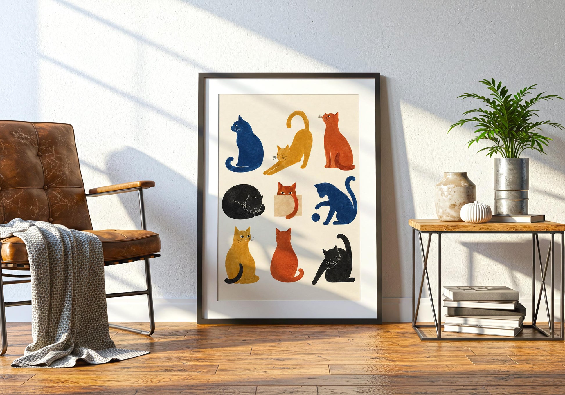 Colourful feline wall decor featuring blue, orange, yellow and black cats in a simple graphic illustration style.