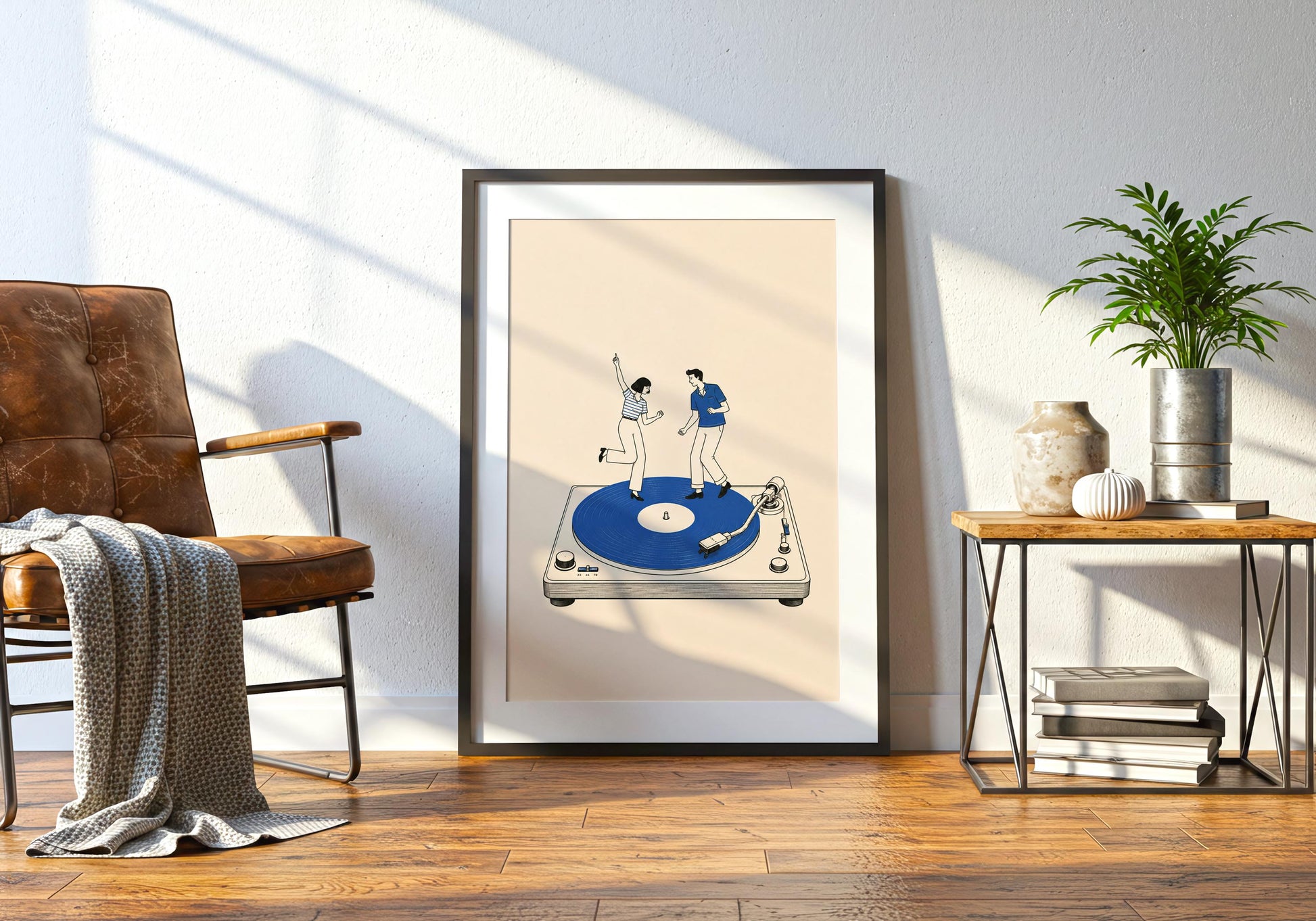 Framed retro couple artwork displayed in a bright interior with a cream background and strong blue focal point.