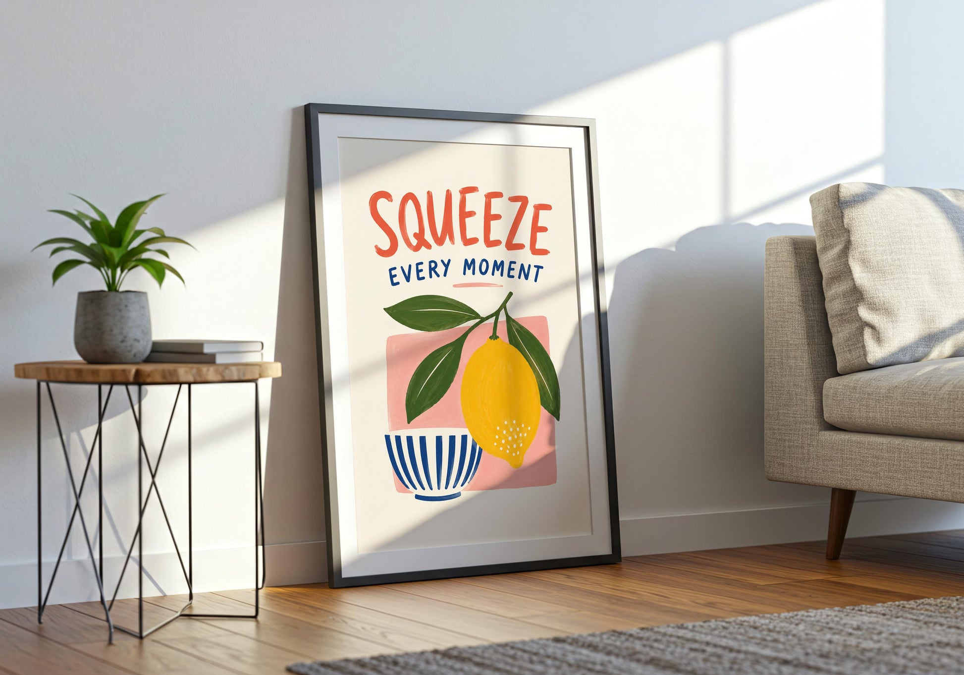 Mediterranean-inspired kitchen print featuring a bright yellow lemon, green leaves, cobalt blue stripes and coral lettering.