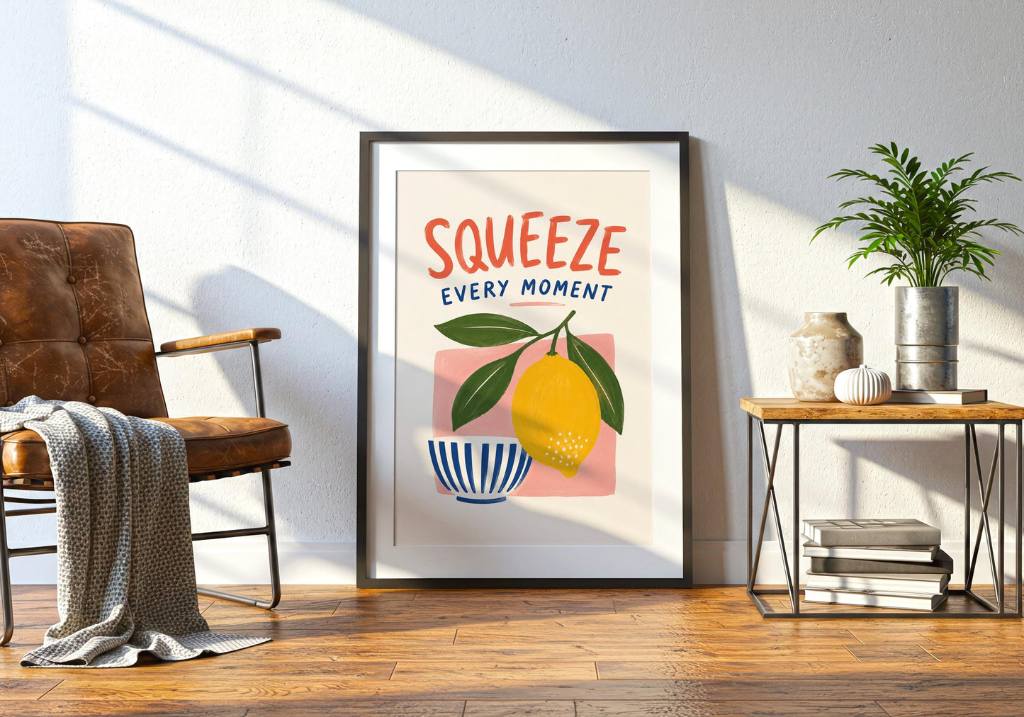 Playful fruit poster with Squeeze Every Moment typography and a large painted lemon against a soft pink background.
