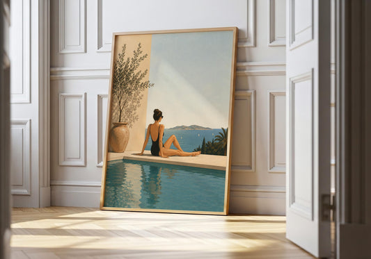 Mediterranean poolside art print showing a woman in a black swimsuit relaxing beside a blue pool overlooking the sea.
