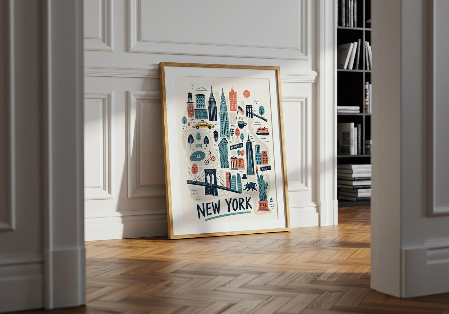 Colourful New York City print displayed in a simple wooden frame against a bright neutral interior wall.