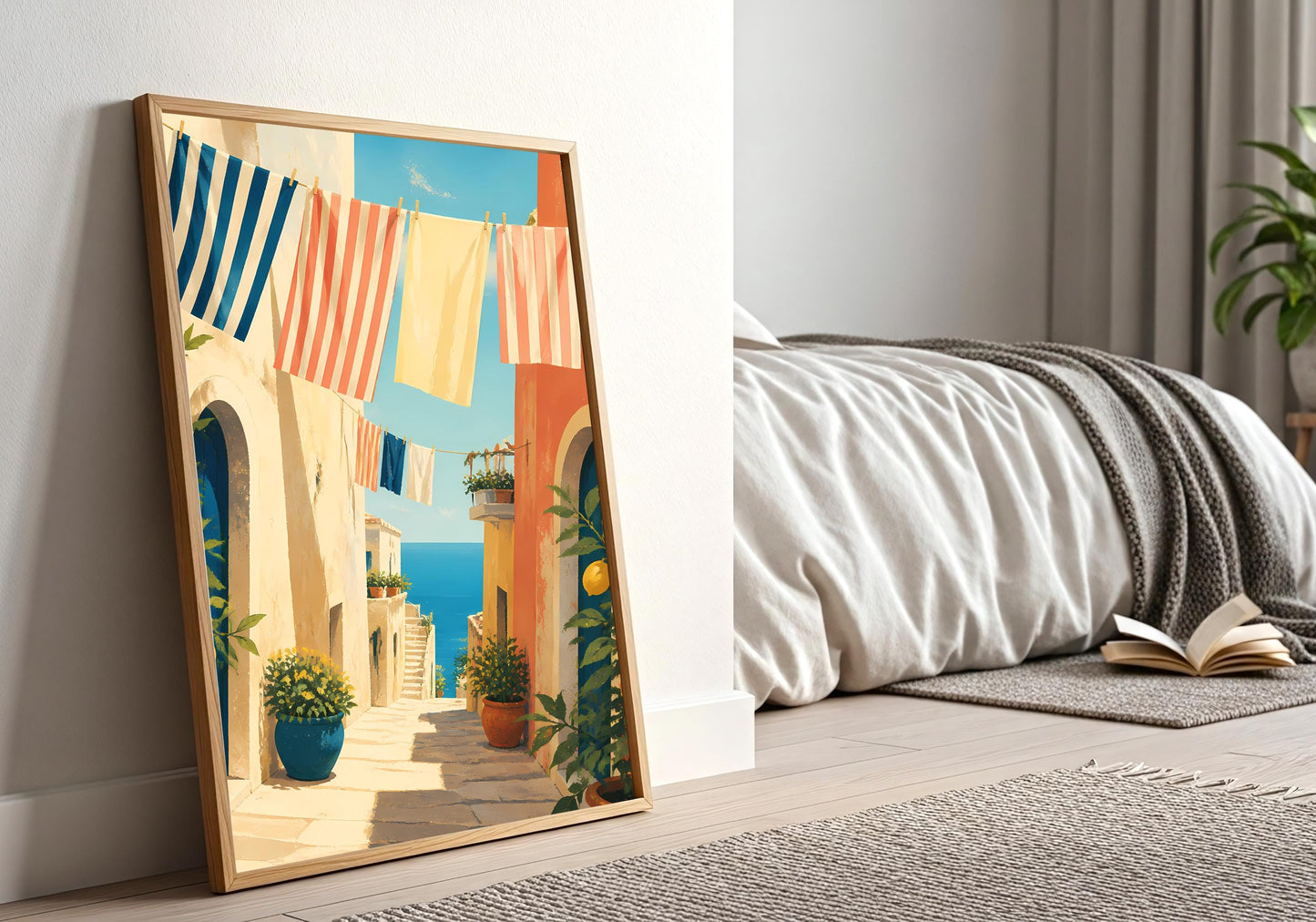 Colorful Mediterranean village print in oak frame, warm terracotta and blue architecture, coastal home decor