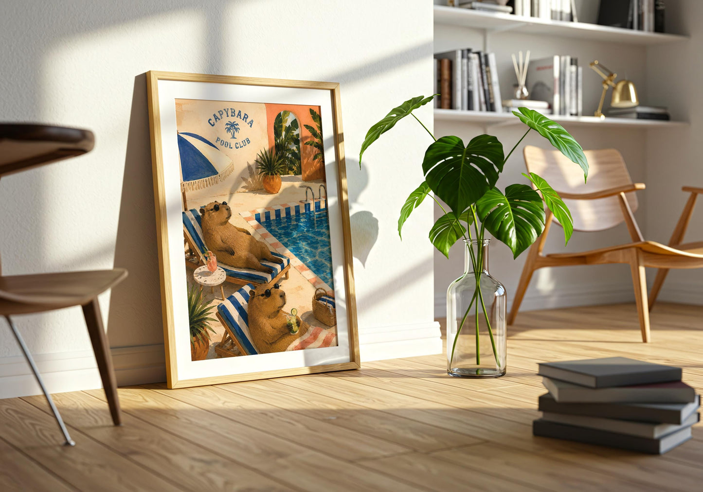Retro tropical animal artwork in cobalt blue, peach and cream with capybaras enjoying a sunny swimming pool.