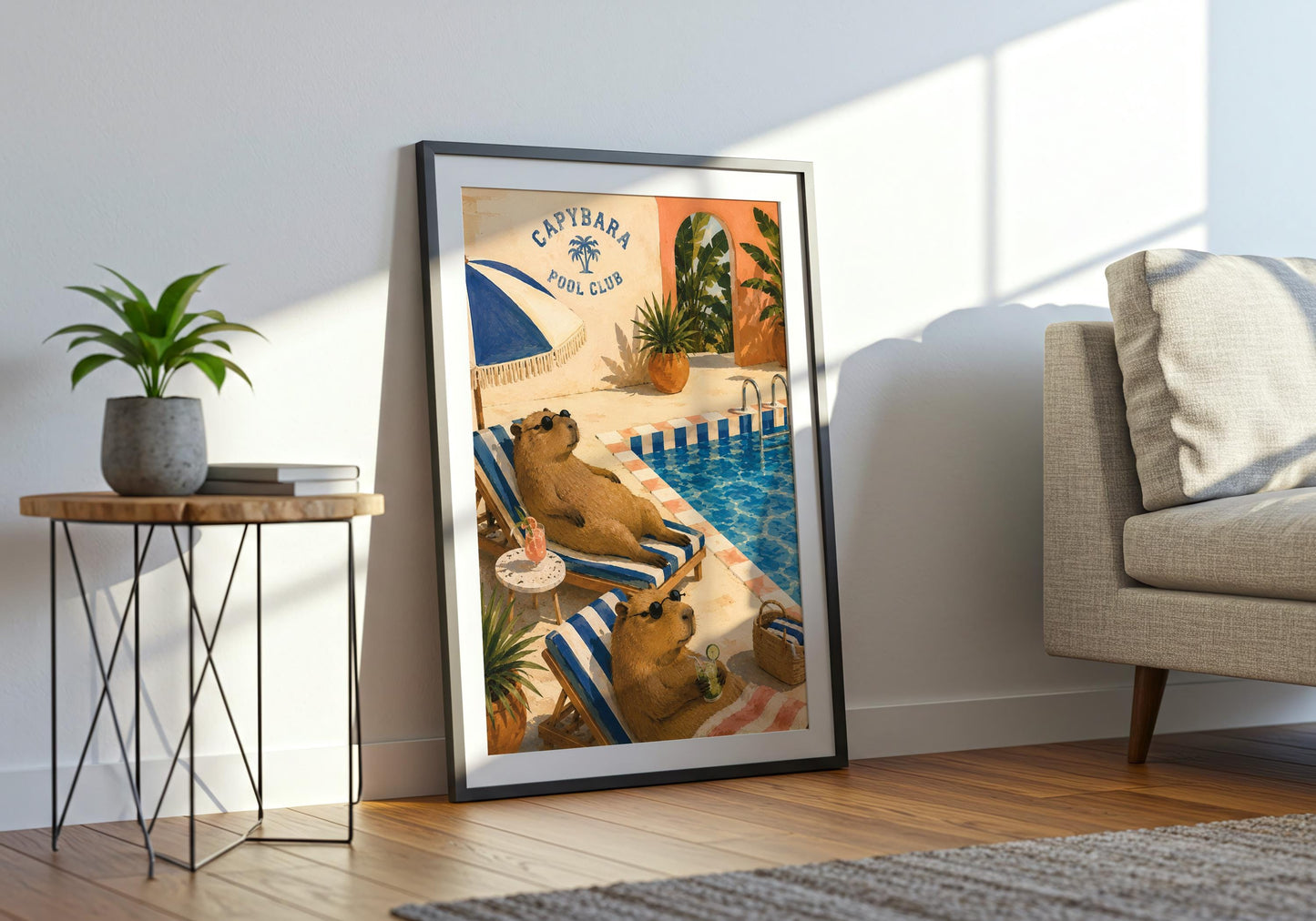 Funny bathroom or bedroom print featuring relaxed capybaras, striped deckchairs and Mediterranean-inspired poolside decor.