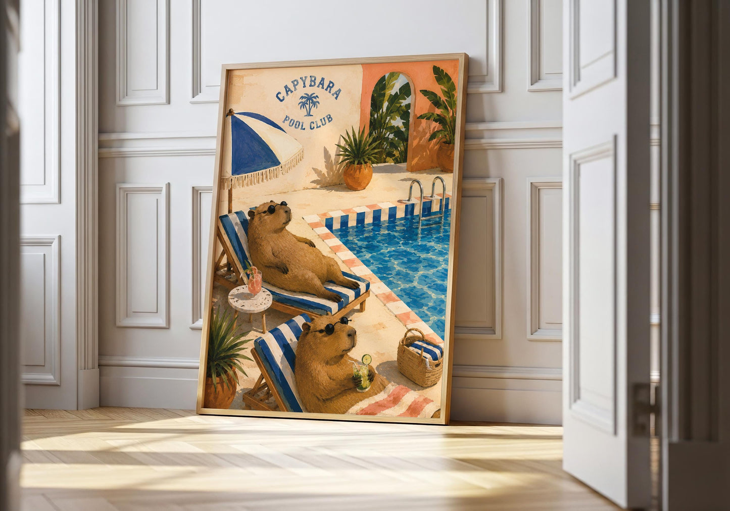 Retro capybara wall art showing two capybaras wearing sunglasses and relaxing on striped loungers beside a swimming pool.