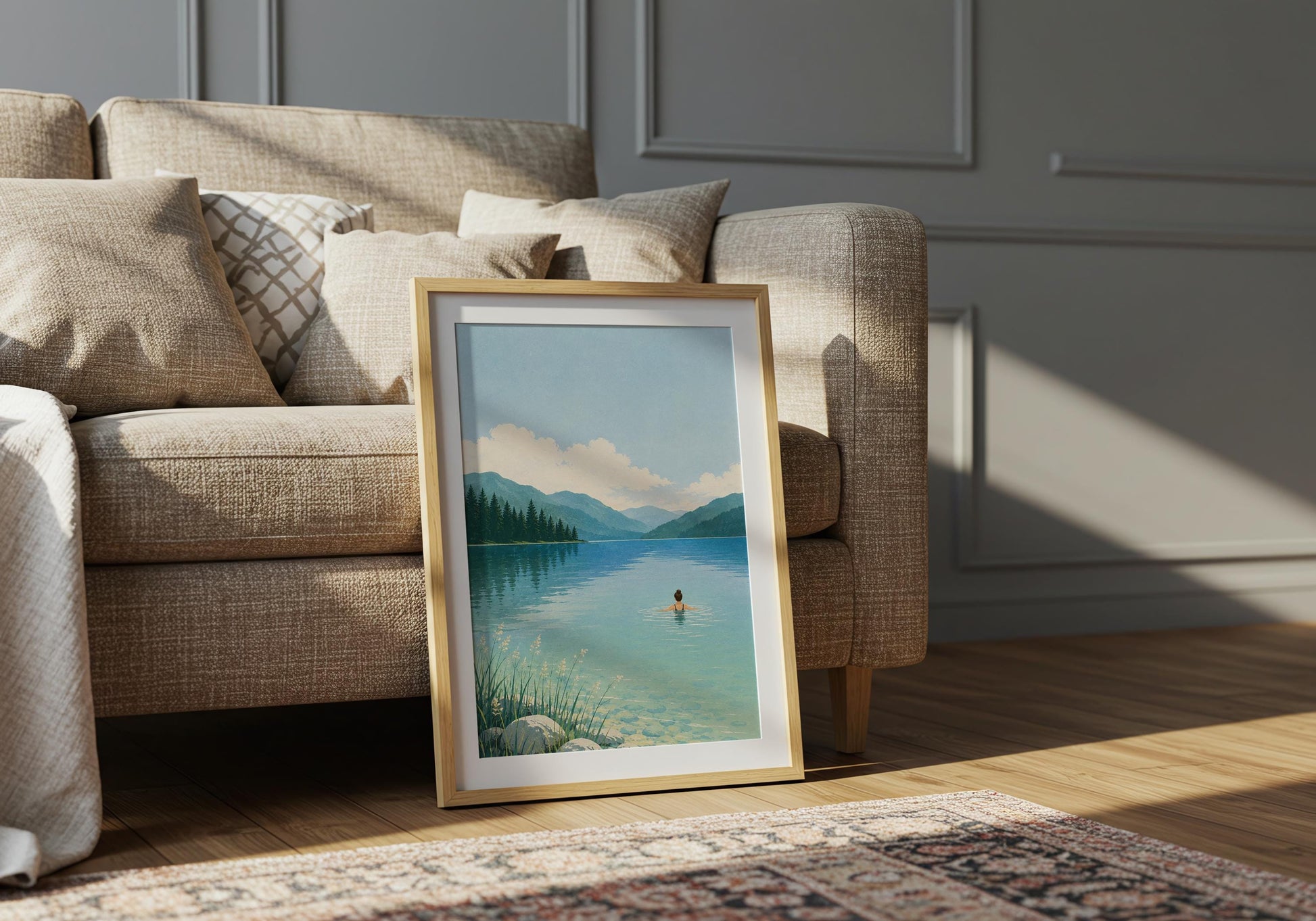Calming blue landscape poster with mountain reflections, shoreline grasses and a solitary figure swimming in the lake.