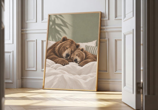 Sleeping Bears sleeping bear nursery featuring a parent bear and cub tucked together beneath a white duvet, leaning in a light natural-wood hero frame against bright white panelling.